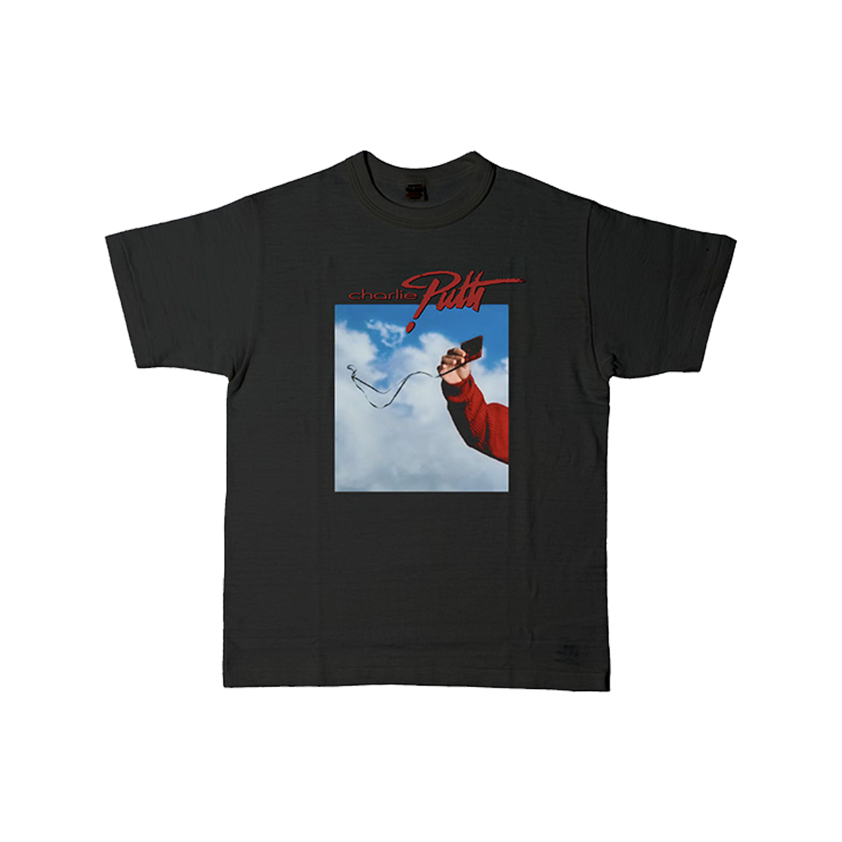 Black t-shirt with Charlie Puth logo in red and graphic of Charlie's arm holding a cassette tape in the clouds 