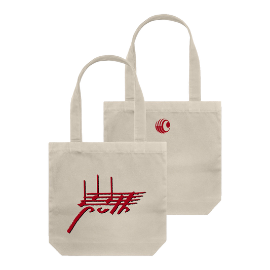 Beige tote with Puth musical notes logo in red text on one side and Charlie Puth circle logo on the other side